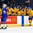 BUFFALO, NEW YORK - JANUARY 4: Sweden's Elias Pettersson #14 celebrates his second period goal against USA with teammates on the players' bench during the semi-final round of the 2018 IIHF World Junior Championship. (Photo by Andrea Cardin/HHOF-IIHF Images)

